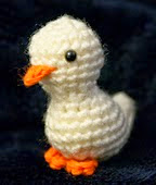 http://www.ravelry.com/patterns/library/easy-miniature-duck-one-hour-amigurumi-crochet-pattern