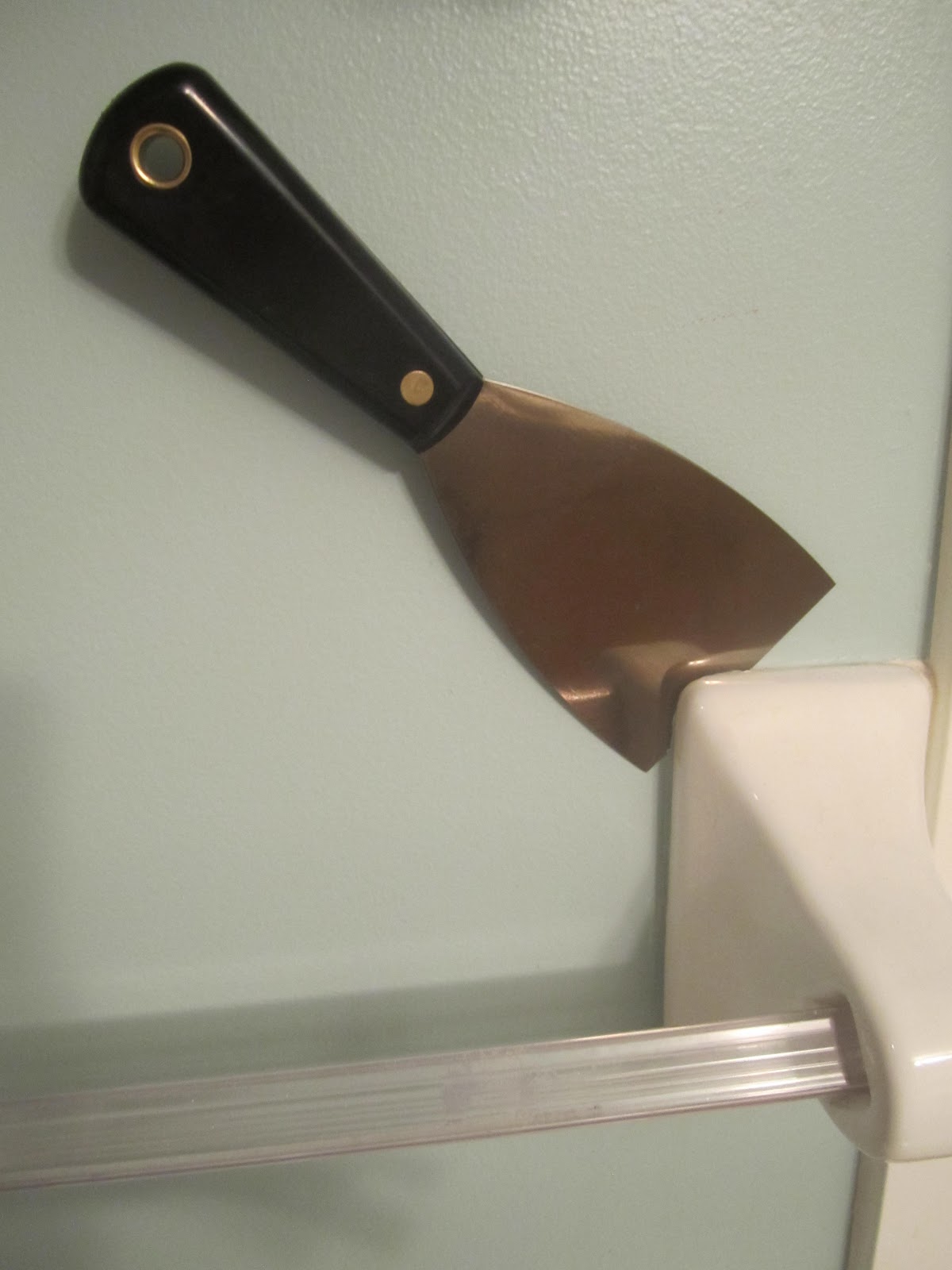 Waffling I Had a Rackcident {How to Remove a Glued on Towel Rack}