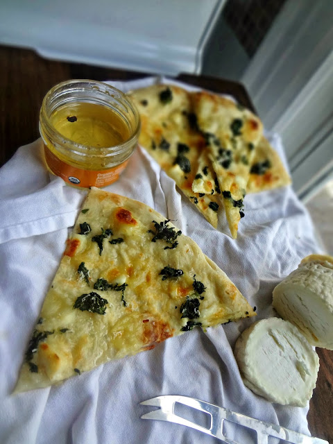 Chevre and Spinach Pizza with Truffle Honey