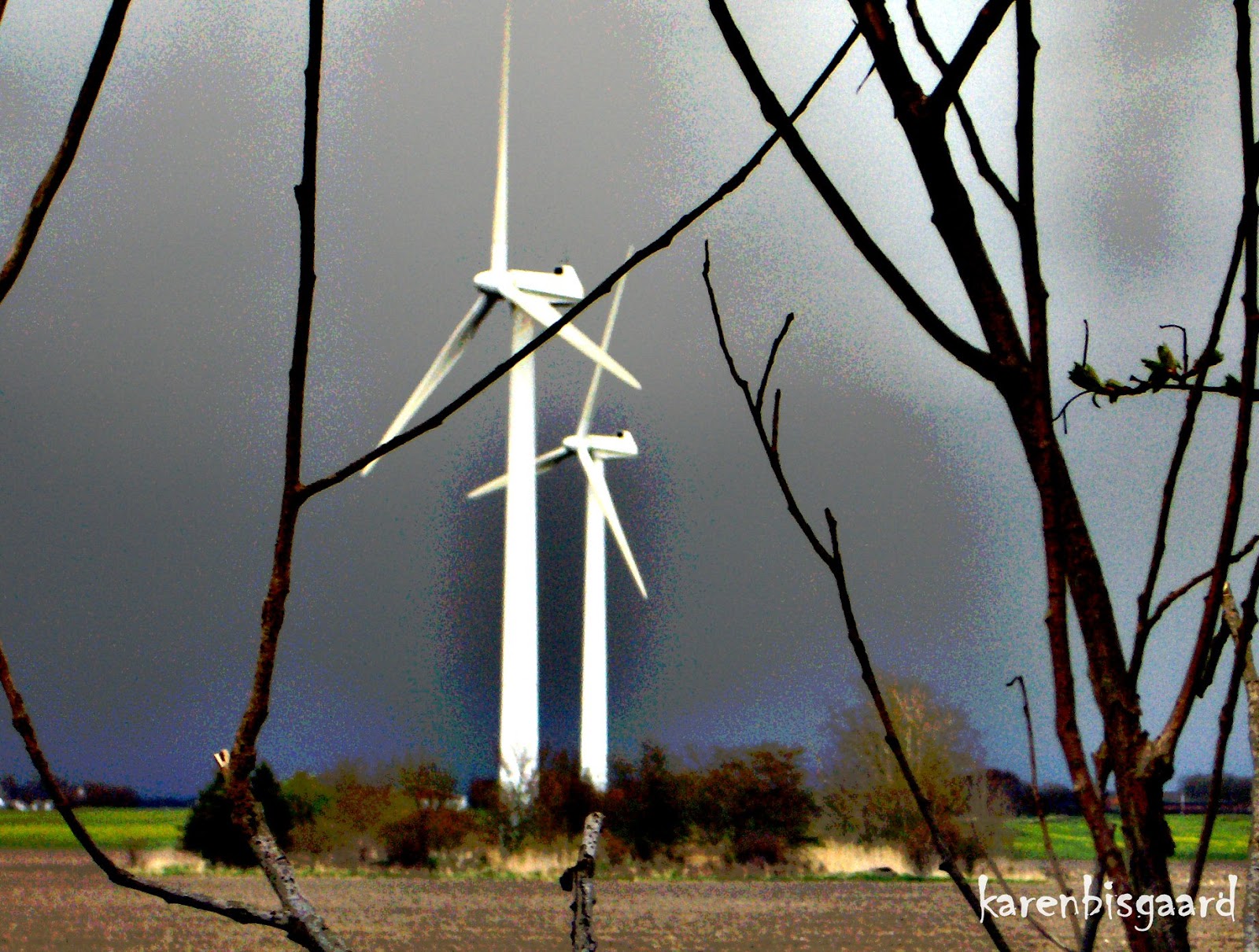 Karen`s Nature Photography White Windmills Towering over Landscape.