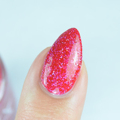 red holo nail polish close up