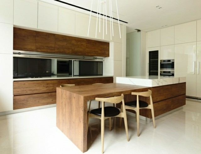 Arte y arquitectura: cocinas con isla y mesa adosada