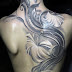 Soft silver color flower tattoo on full back
