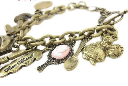 Ellen Tracy Inspired: Bronze Pleasure Charms Bracelet - B62 (Sold Out ...