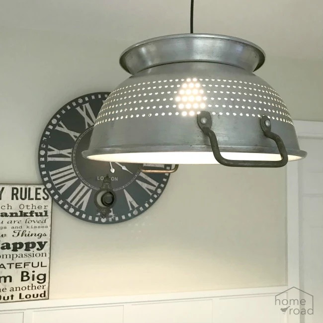 Hanging colander light and clock