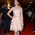 Rakul Preet Singh legs Show Stills In Mini Pink Dress