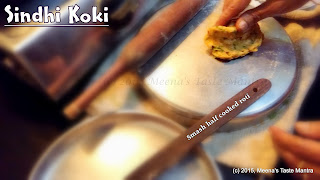 Sindhi Koki - Mash the semi cooked roti