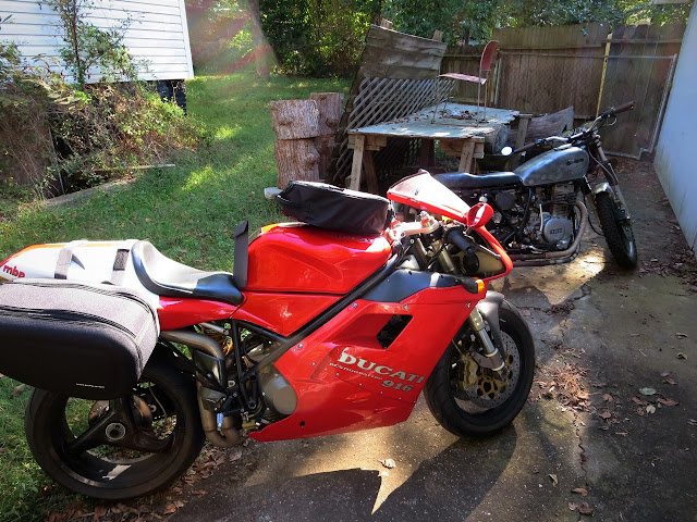 Ducati 916 and Yamaha XS400 motorcycles