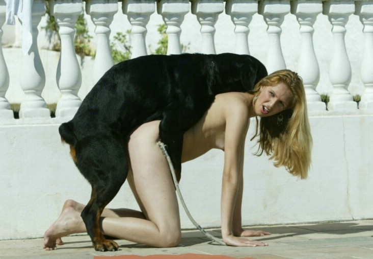 Sexy girl having sex with dog.
