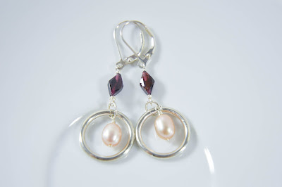 pink pearl and garnet earrings sterling silver ring encircled hoop 