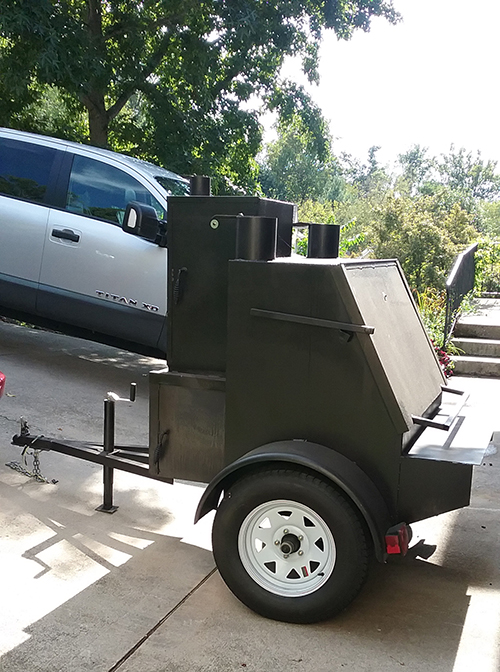 Stick burner BBQ smoker trailer pit.