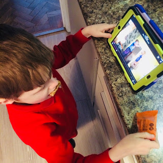 David plays with his iPad while trying a flapjack - ideas to help my fussy eaters