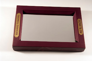 The mirror-book "Reflexions" has a real mirror on his cover and the frame-box can be used has a passe-partout