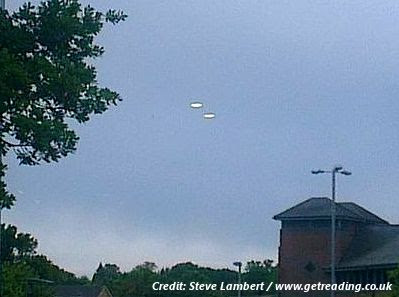 Disc-Shaped UFOs Photographed Over Bracknell, UK  6-7-13