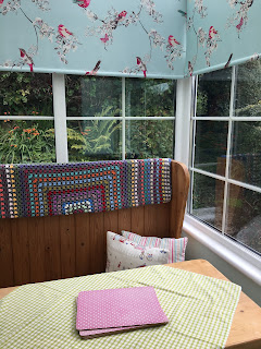 Crochet blanket in the garden room