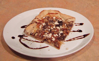 Steak Pizza topped with a Feta Cheese and a Balsamic Glaze