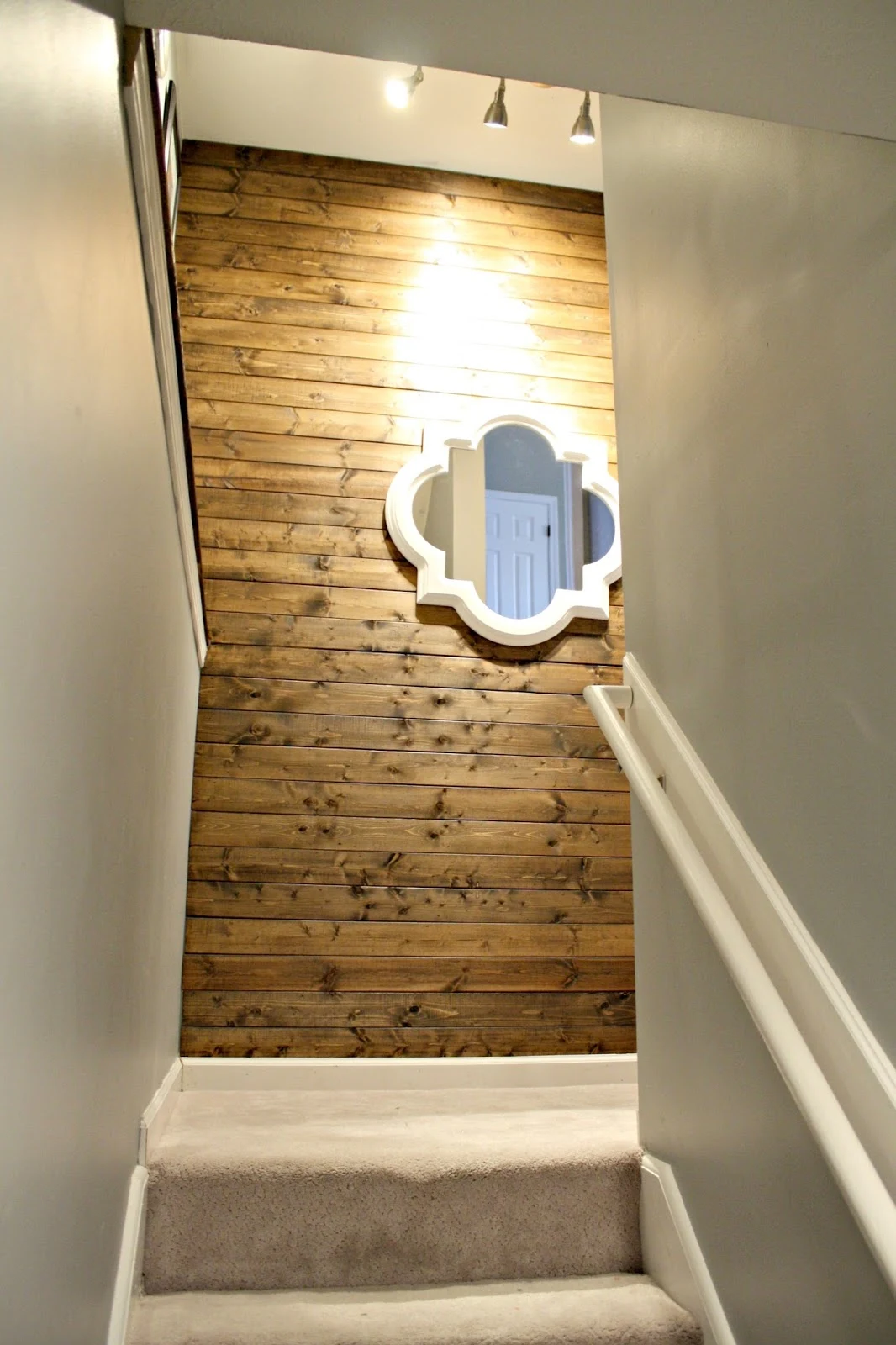wood planked wall stairs