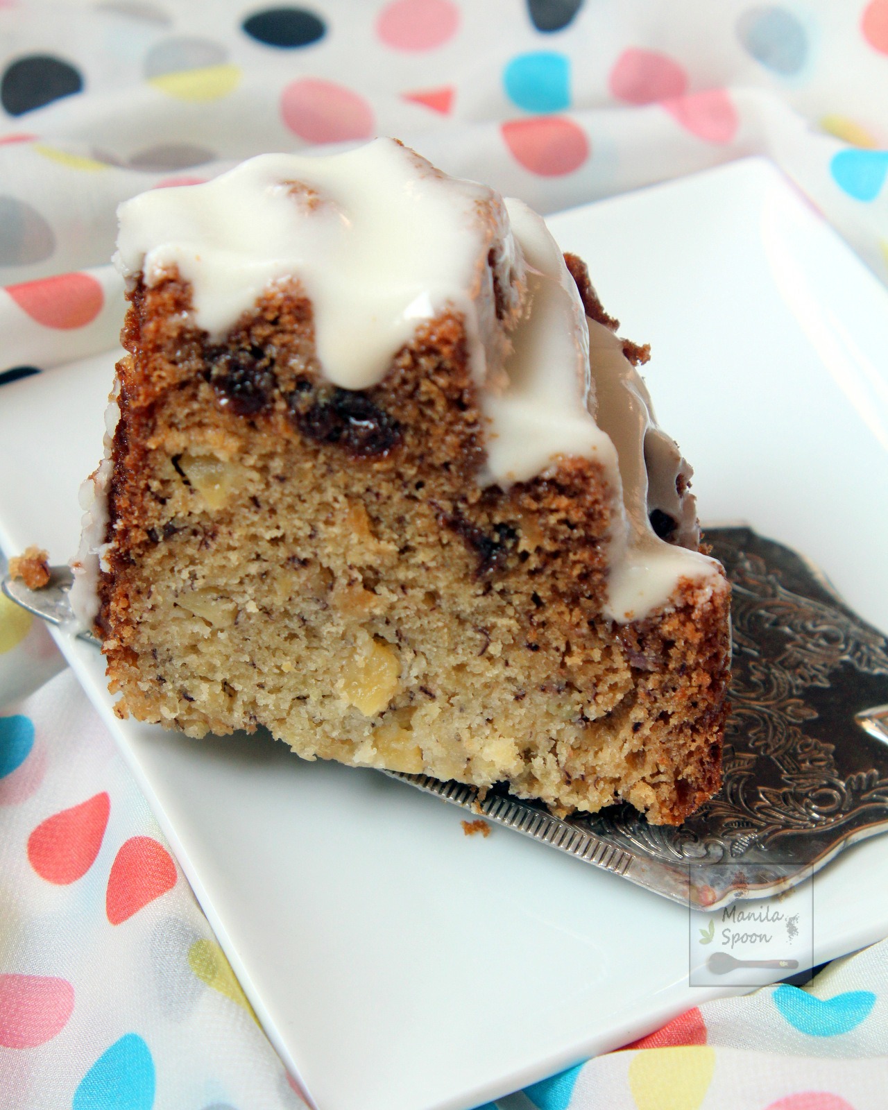 Bursting with tropical flavors from bananas and pineapples this cake is delicious and super moist! Perfect with your coffee or tea. | manilaspoon.com