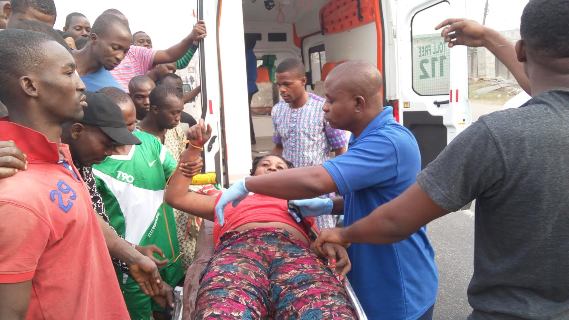 3 Mentally unstable lady knocked down by a vehicle after she ran into the road following violent behavior (photos)