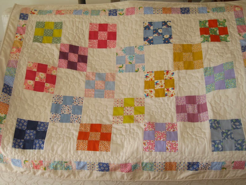 Four patch baby quilt