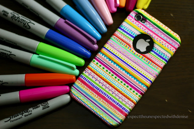 sharpie decorated phone case with various sharpie pen colors 