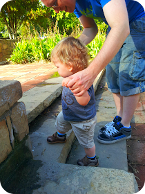 learning to climb stairs, Park guell, barcelona with a toddler