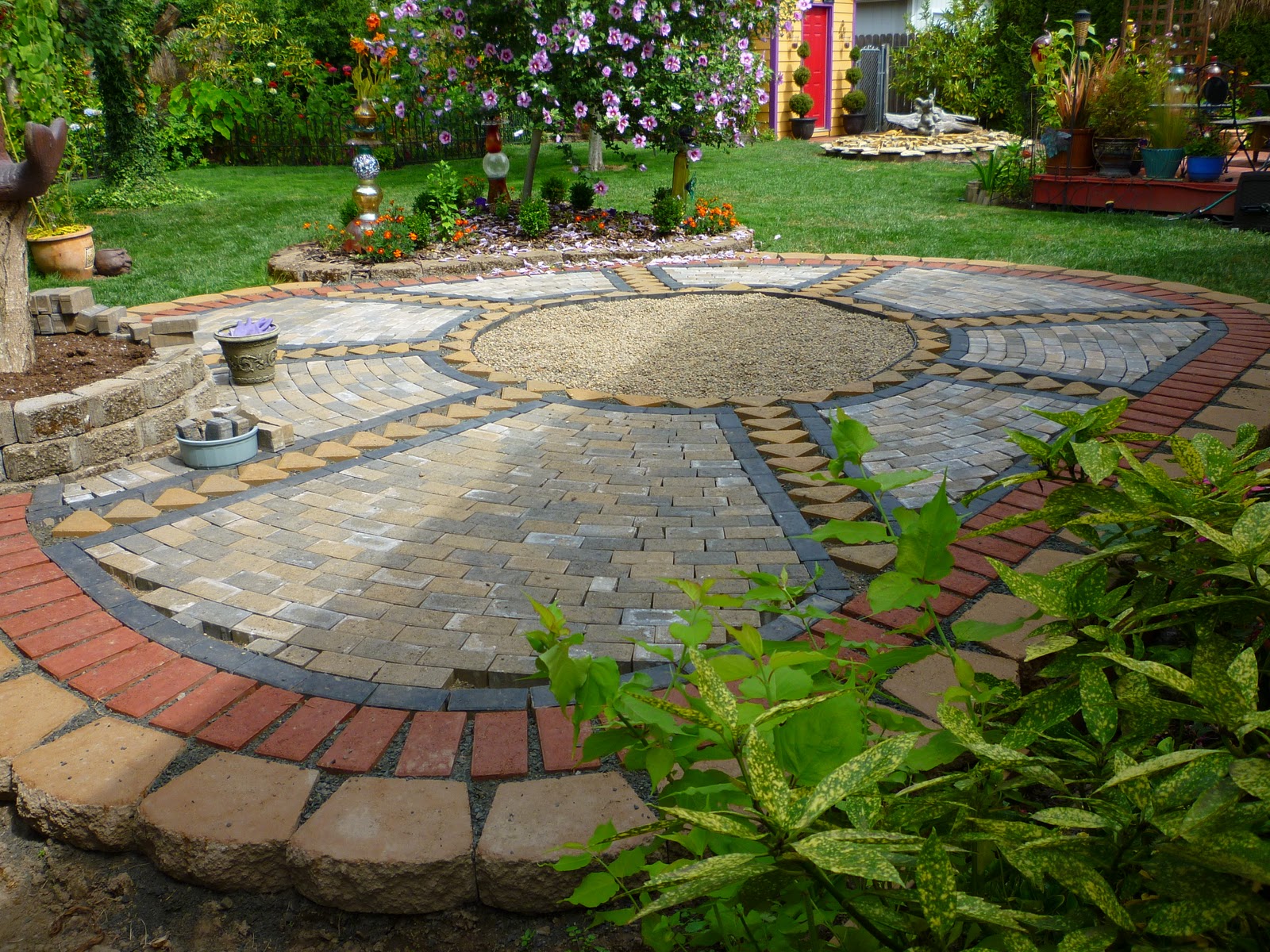 Wow, thats a busy Garden!: Creating A Paver and Pebble Mosaic Patio