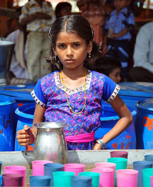 portrait indian tribal woman women girl tarnetar gujarat fair festival colourful face