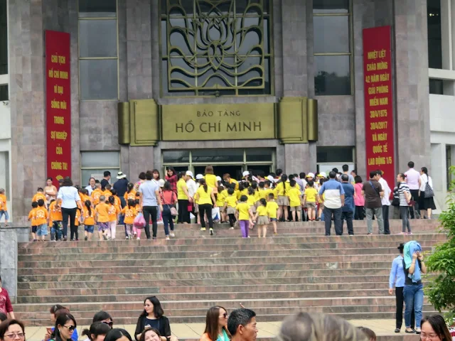 School children heading to the Ho Chi Minh Museum in Hanoi Vietnam