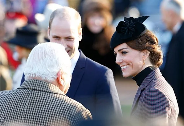 Queen Elizabeth II, Kate Middleton, Prince Philip, Duke of Edinburgh and Prince William, Duke of Cambridge attend a wreath laying ceremony to mark the 100th anniversary of the final withdrawal from the Gallipoli Peninsula at the War Memorial Cross