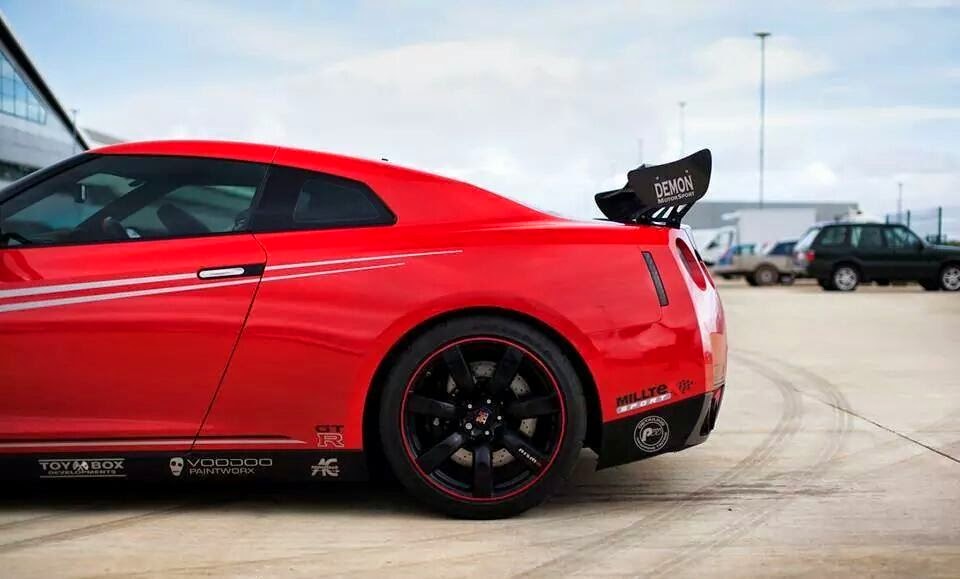 First Choice Wheels and Tires GTR sitting on Black wheels with red stripe