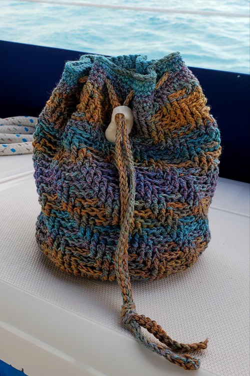 Beautiful skills  crochet knitting quilting  sand dollar beach bag