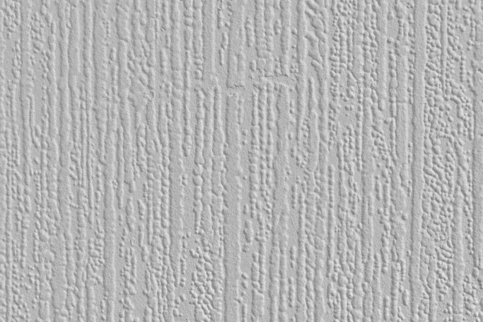 White stucco plaster wall paper texture up close