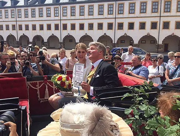 Princess Stephanie of Saxe-Coburg and Gotha wore a white silk wedding dress from German fashion designer Gordon Sieverding, who is based in Michelau