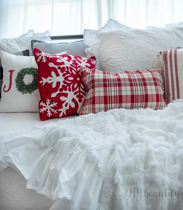 daybed filled with Christmas pillows