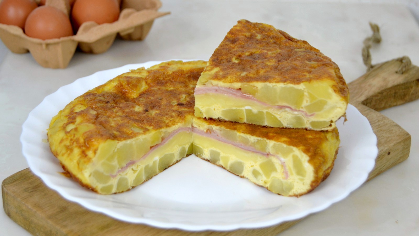 Tortilla de patatas rellena de jamón y queso Cuuking! Recetas de cocina