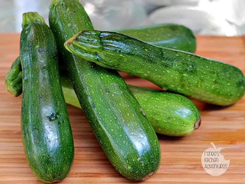 Zucchini, whole, on a cutting board