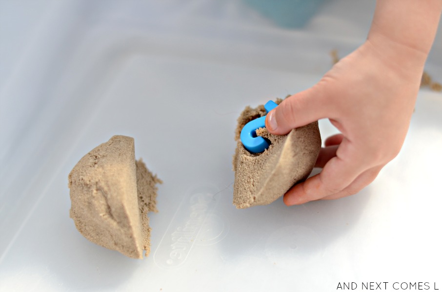 Number hunt activity for kids with kinetic sand