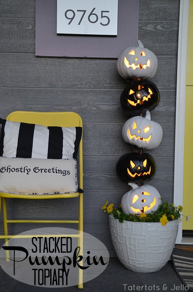 Halloween pumpkin lights front door decor ideas 18 best Halloween front door decoration ideas. Halloween monster mouth door decoration ideas. Fun theme for Halloween. Party decoration ideas for Halloween. Scary door craft ideas. White and black Halloween topiary pumpkins.