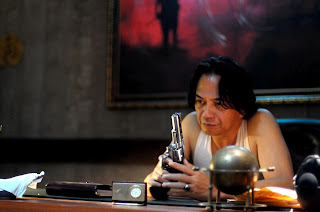 Ray Sahetapy as Tama in The Raid: Redemption