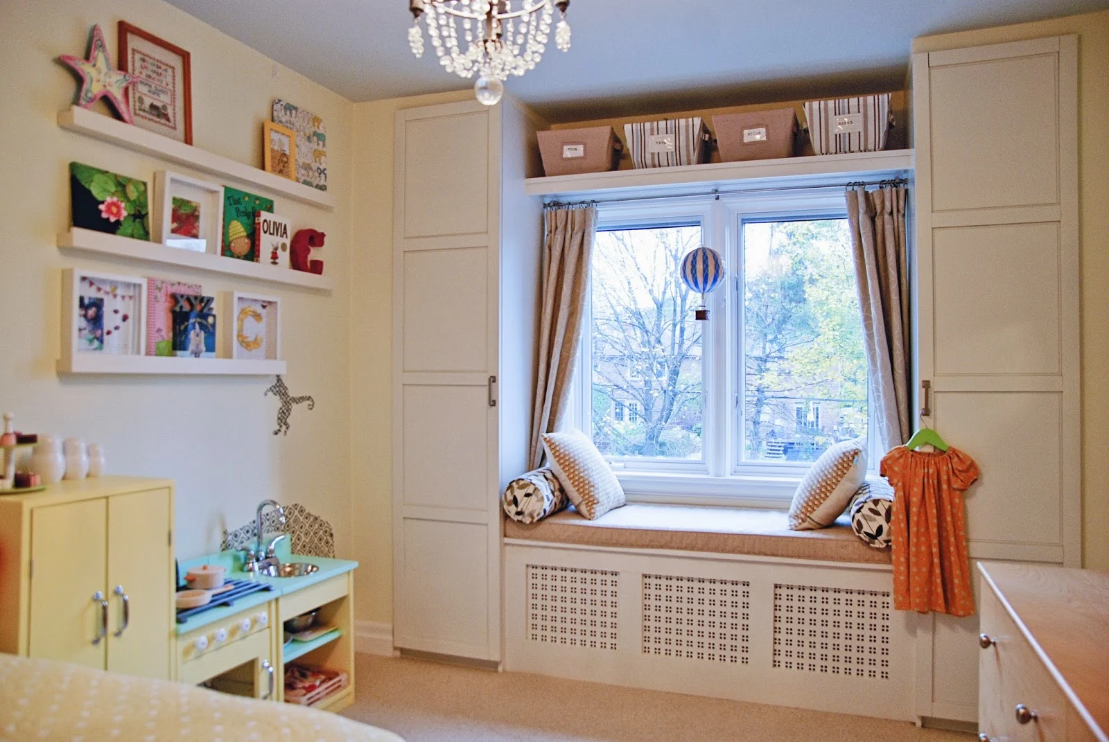 nursery bedroom built in bench radiator yellow