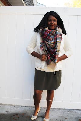 An outfit inspiration post featuring a J. Crew Factory puffer vest, plaid blanket scarf and cream flats.