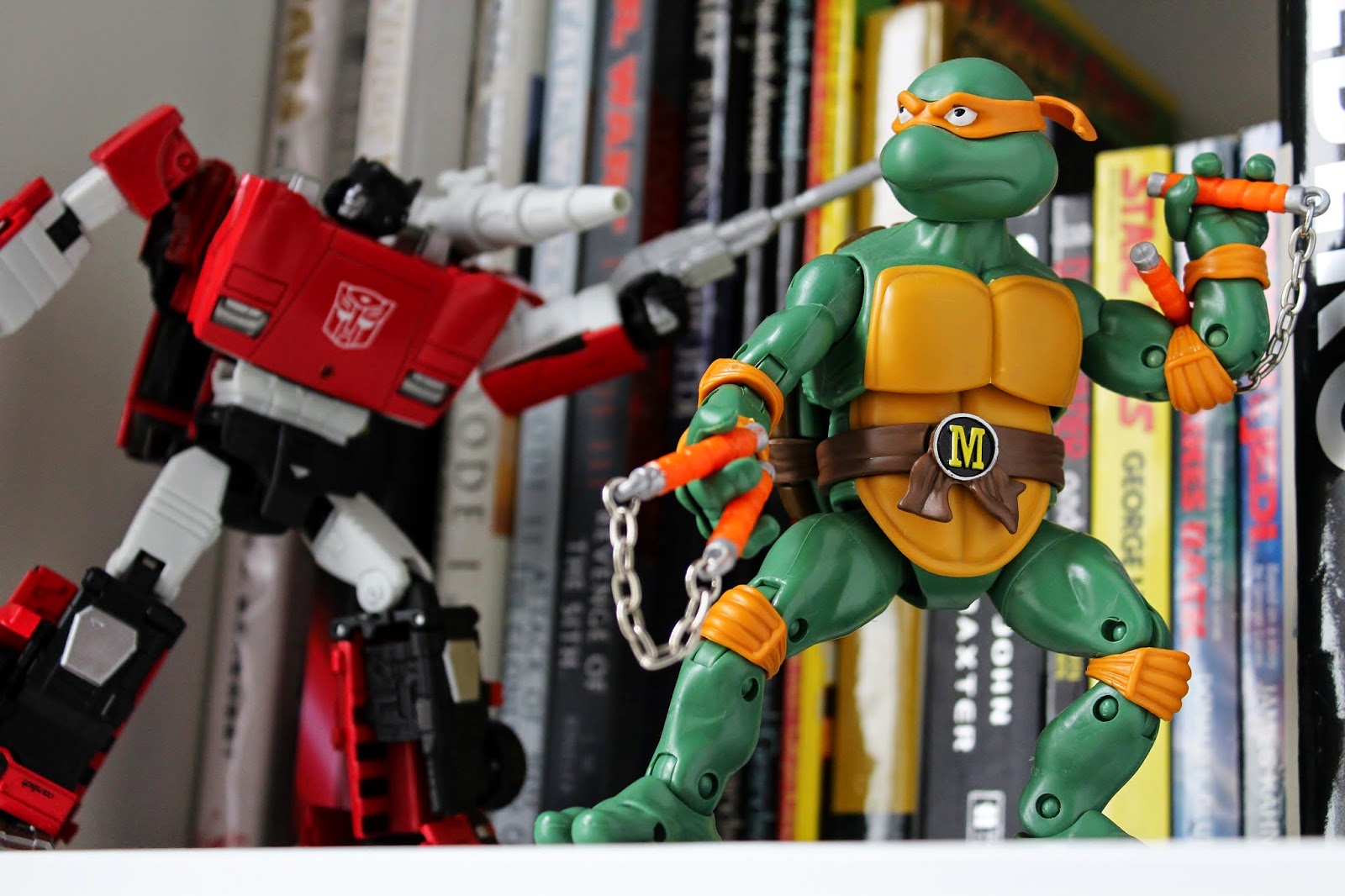 Transformers Masterpiece Sideswipe and TMNT Classics Michelangelo on the shelf | The Mos Espa Collection