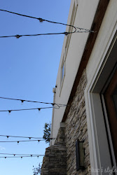 string lights hang patio outdoor hanging wire backyard lighting commercial cafe deck grade yard round installation blueistyleblog pool permanent landscape