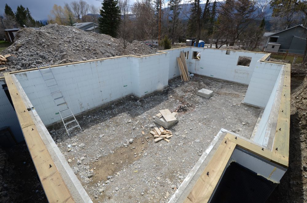 Windermere Green Home: Basement - pouring walls and dimple board