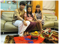 Family photo of Darren, Dylea and Yanti, from left to right