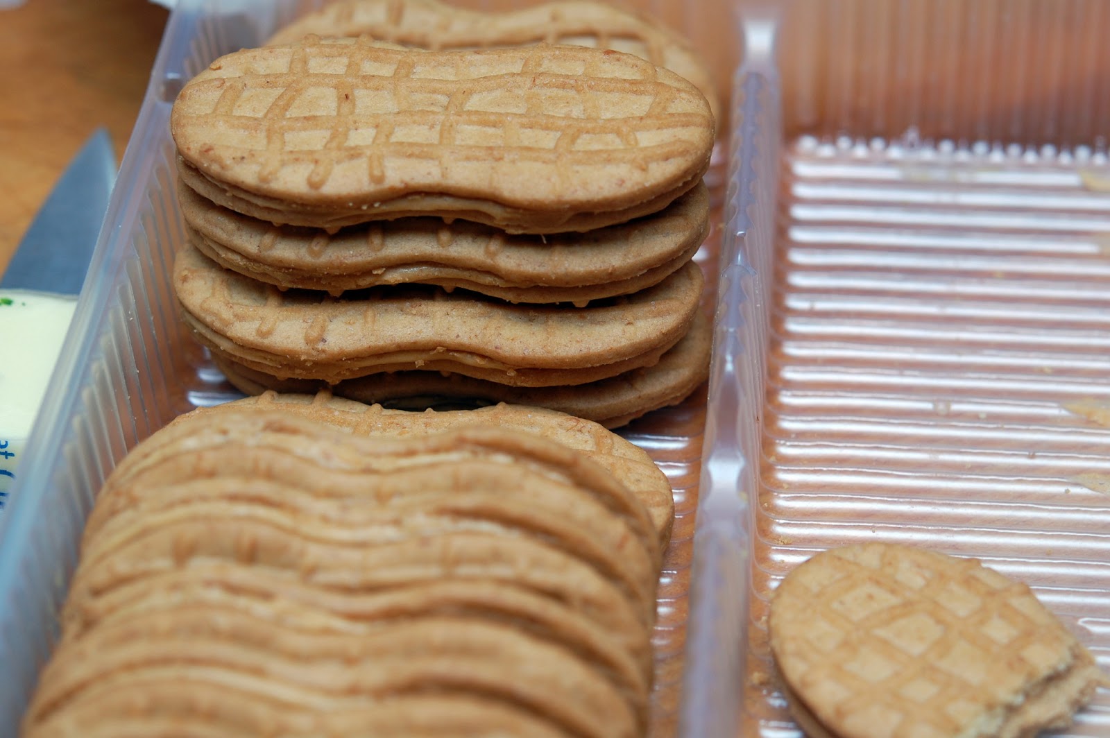 NUTTER BUTTER CHOCOLATE CHEESECAKE BARS ON A CHOCOLATE CHIP COOKIE