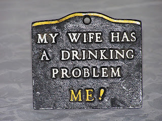 http://www.ebay.com/itm/Vintage-Collectibles-Cast-Aluminum-Wall-Plaque-My-Wife-Has-A-Drinking-Problem-Me-/251307570050?pt=Plaques_Signs&hash=item3a83193382