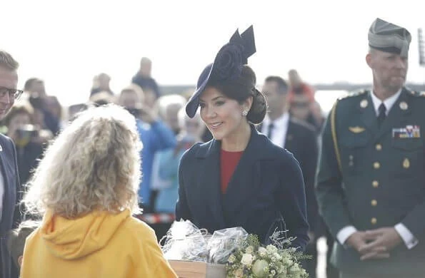 Crown Princess Mary officially opened Crown Princess Mary's Bridge in Roskilde.She is wearing blue coat and dolce Gabbana dress