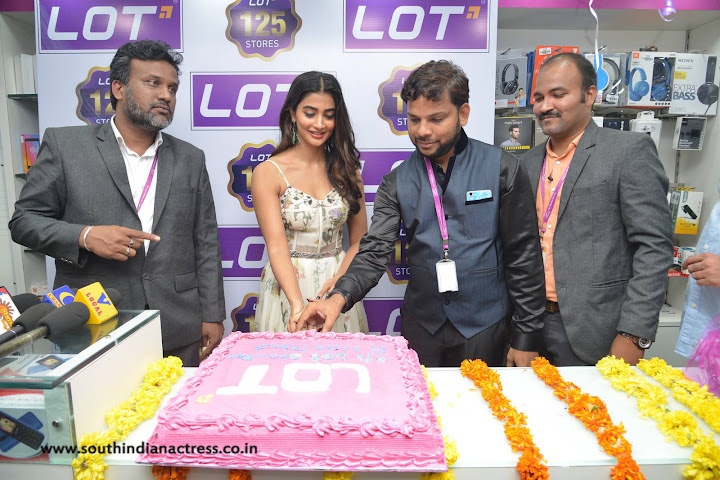 Pooja Hegde at Lot Mobile Store in Vijayawada